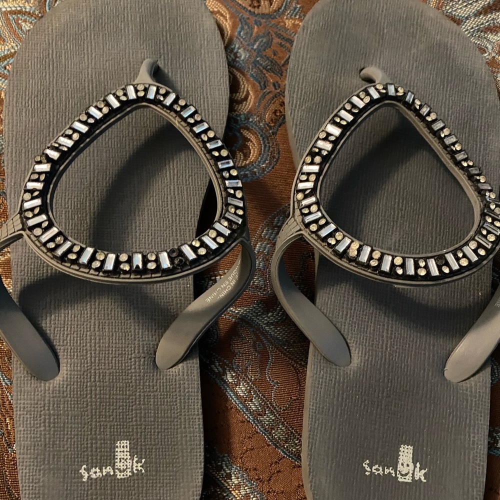 Sanuk sandals.